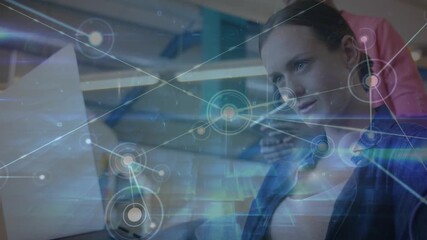 Animation of network of connections over female teacher and students - Powered by Adobe