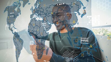 Data processing over world map against african american man using digital tablet - Powered by Adobe
