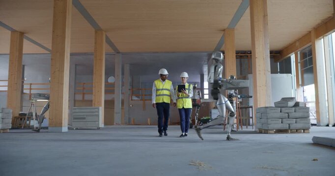 On Building Construction Site Humanoid Robots Collaborate With Engineers. AI Construction Work, Autonomous Material Handling, Advanced Building Automation, Active Development, Algorithmic Optimization