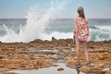Mature woman looking the sea. Retiremet pensioner elderly. Relaxing lifestyle