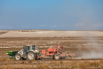Tractor plowing the field. Agriculture rural industry. Harvest time. Spain