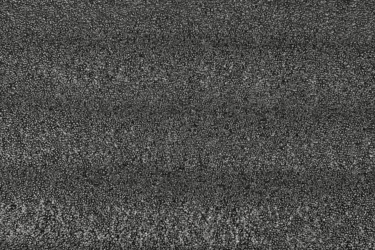 black plastic polystyrene textured background