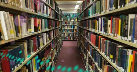 Animation of spots and data processing over books on shelves in library - Powered by Adobe