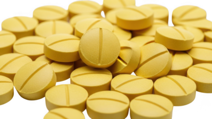Pile of yellow round pills with dividing line on background isolated on a transparent background medicine
