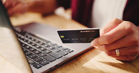 Hands, laptop and credit card for online shopping in home, easy payment and digital banking for bills. Person, computer and transaction with ecommerce, fintech and retail discount on web at apartment