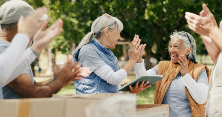 Volunteer, high five and people in park with tablet, teamwork and clap in relief campaign support....