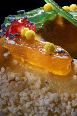 Close up of candied fruit  and sugar on a french epiphany brioche