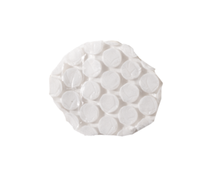 Round torn fragment of transparent bubble wrap with inflated air pockets and glossy plastic texture.