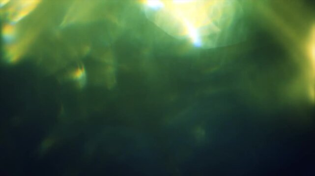 Green Light Leaks Pulsing Effect, Abstract Lens Flare and Bokeh Background Overlay 4k video animation seamless loop
