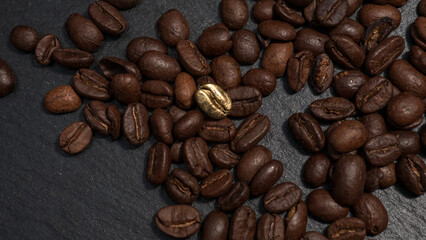 Fototapeta premium Golden Coffee Bean as Symbol of Luxury and Rising Value