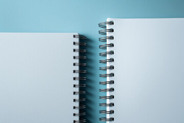 Notebook Spiral on a Light Blue Background