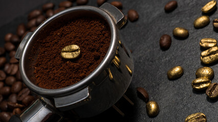 Espresso portafilter filled with ground coffee featuring a single golden coffee bean, surrounded by...