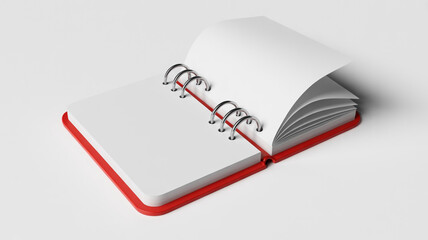 Open spiral bound notebook with blank white pages and a vibrant red cover