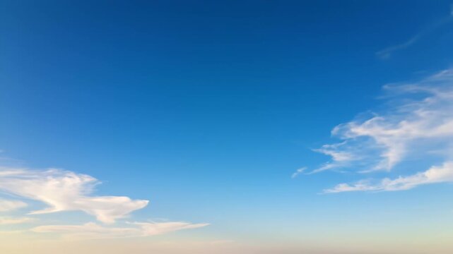 Blue sky with wispy clouds