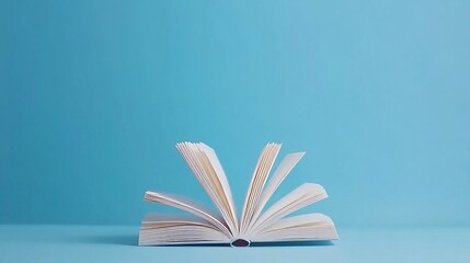 Minimal Open Book with Light Animation, Turning Pages on Blue Background, Simple and Elegant Design
