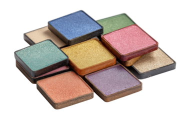Set of small square makeup pans in various colors with smooth pressed powder surfaces, clean palette tile edges, and cosmetic kit organization isolated on transparent background.
