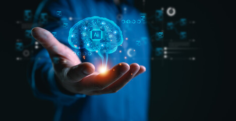 Futuristic artificial intelligence brain with circuits above a human hand. Concept of AI technology, deep learning, and innovation in machine intelligence, automation, and digital transformation.