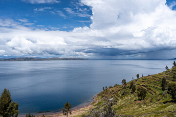 Obraz premium Scenic view of nature and terraced fields on Taquile Island, Peru