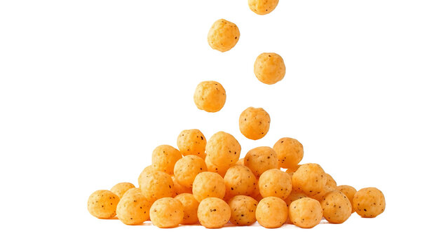 Delicious cheese puffs falling on top of a pile of cheese balls isolated on white background