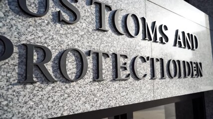 US Customs and Protection sign on building