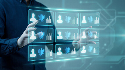 Person interacting with futuristic digital security interface displaying user profiles and protection data