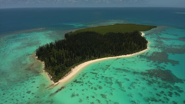 Aerial view over Ilot Brosse, or Brush Island, a deserted island in lagoon of Isle of Pines, New Caledonia.