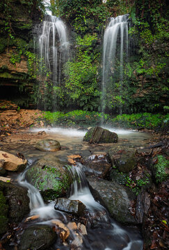 Dripping well waterfall inside Hastings country park on the high weald coast east Sussex south east England UK