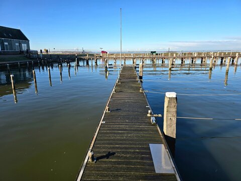 Pier on the lake. Volendam fishing village of the Netherlands.