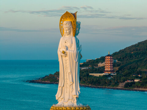 Aerial view of Guanyin statue at seaside in nanshan temple, hainan island , China. Words mean mercy and blessing.