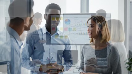 Business team in meeting with data charts - Powered by Adobe