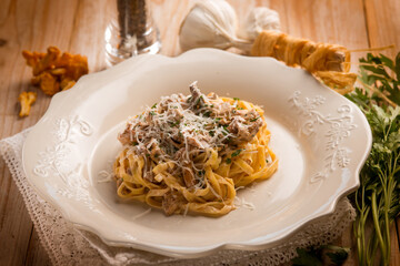 tagliatelle  with chanterelles mushroom and parmesan cheese