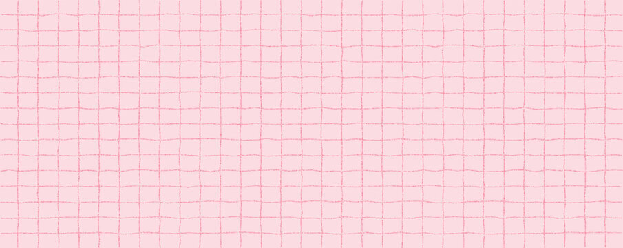 Textured sheet of pink checkered paper with a stipple effect. Cute pastel background, irregular geometric pattern.