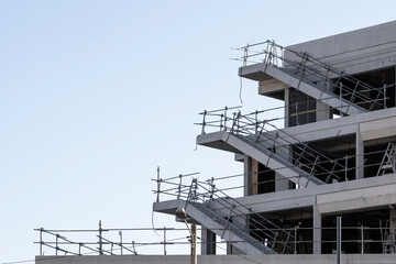 construction crane building architecture urban development property concrete scaffold montpellier France structure with scaffold levels inside frame