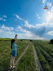 Fototapeta premium young man jumping in the field