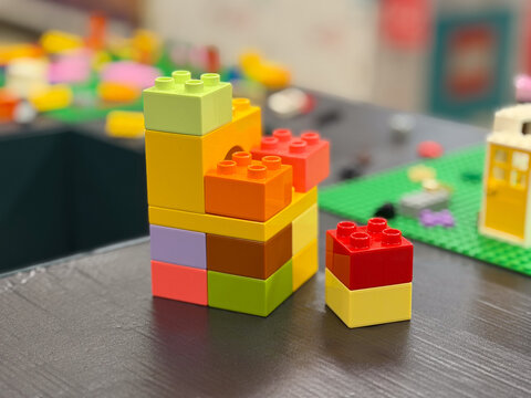 Colorful stacked building blocks lego duplo 