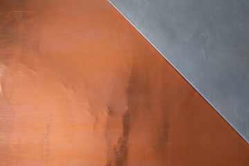 Simple geometric industrial pattern with copper and aluminum surfaces. Copy space.
