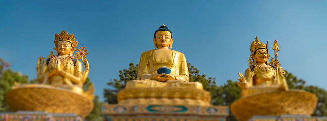 Buddha Park and three Buddha statues in Kathmandu, Nepal.