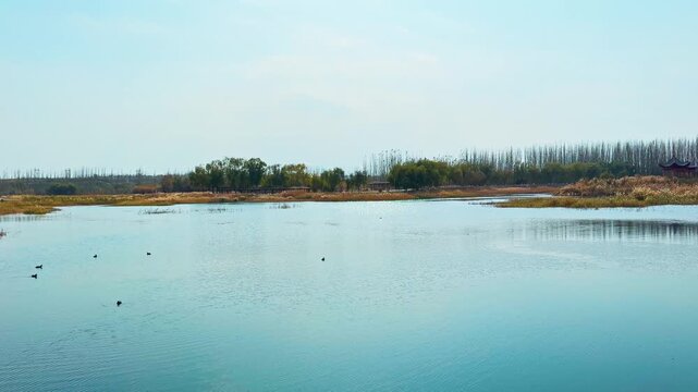 Tranquil Lake With Overhanging Great Wall Near Jiayuguan City In Gansu, China. Panning Shot