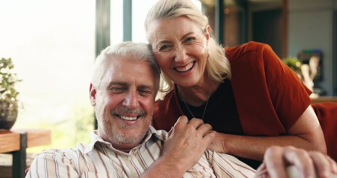 Old couple, face and happy on sofa in home, holding hands and connection with love in retirement. Elderly man, woman and smile in portrait, relationship and laugh with bonding at house in New Zealand