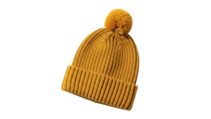Mustard yellow knitted beanie hat with pompom isolated PNG, warm winter headwear for cold weather fashion on transparent background