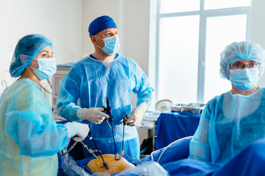 Close up of laparoscopic instrument during gynecological surgery in operating room
