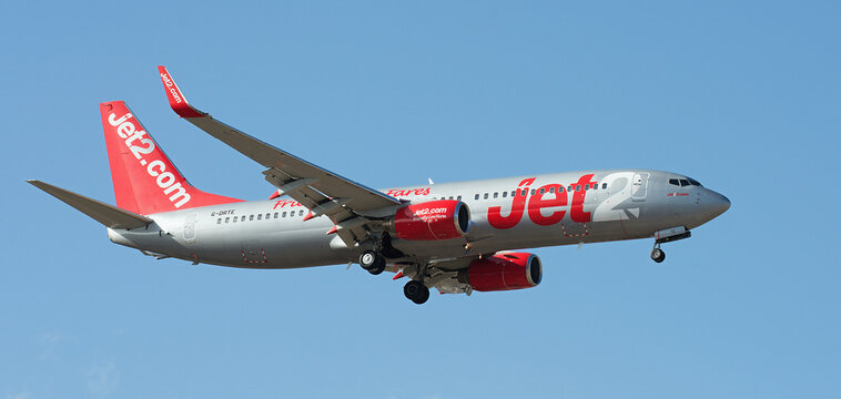 Tenerife, Spain November 28st, 2025. Boeing 737-8K5 Jet2 Airlines flies in the blue sky. Landing at Tenerife Airport