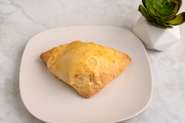 fresh outof the oven orange scone,