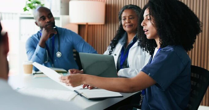 Woman, talking and doctors in meeting, documents and feedback for hospital schedule. Team, medical service and people in clinic, compliance policy and review for medicare support or healthcare report