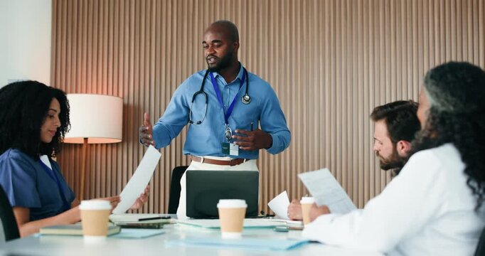 Paper, manager or doctors talk in boardroom, admin or operational planning for private medical practice. People, healthcare committee team or director with steps to improve clinic, discussion or pc