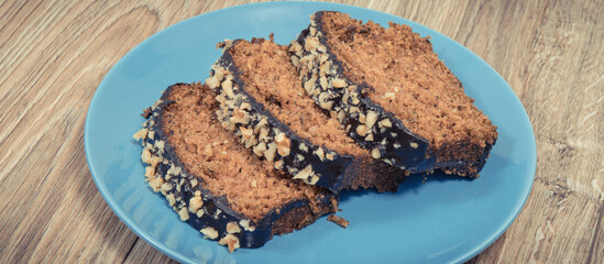 Pieces of zucchini dough with nuts and raisins. Delicious dessert