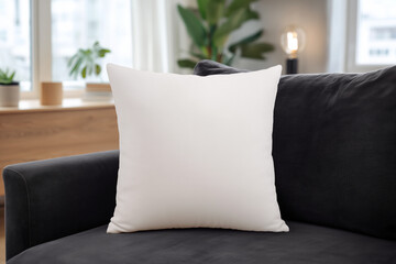 White square throw pillow mockup on dark gray sofa in modern living room interior