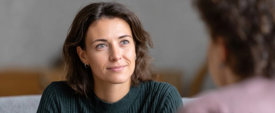 The compassionate social worker explores thoughtful support options with the client during consultation. - Powered by Adobe