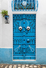Traditional blue gate in Bizerte medina, Tunisia