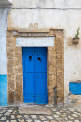 Traditional blue gate in Bizerte medina, Tunisia